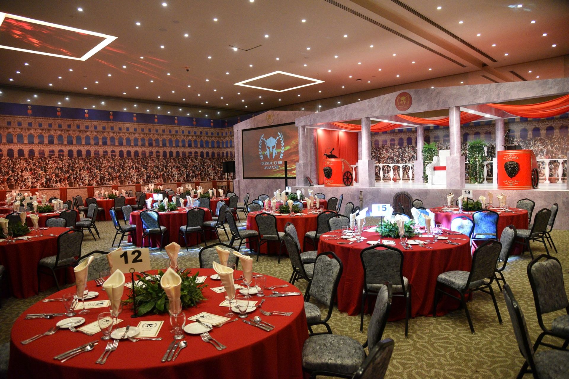 A hall laid out with round tables