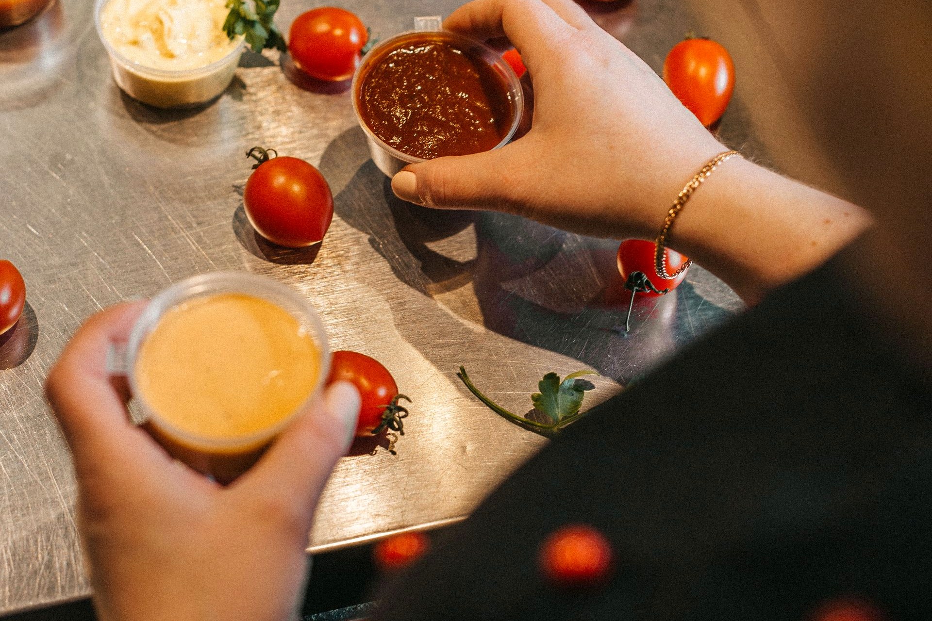 Vegetables and tomatoes being prepared
