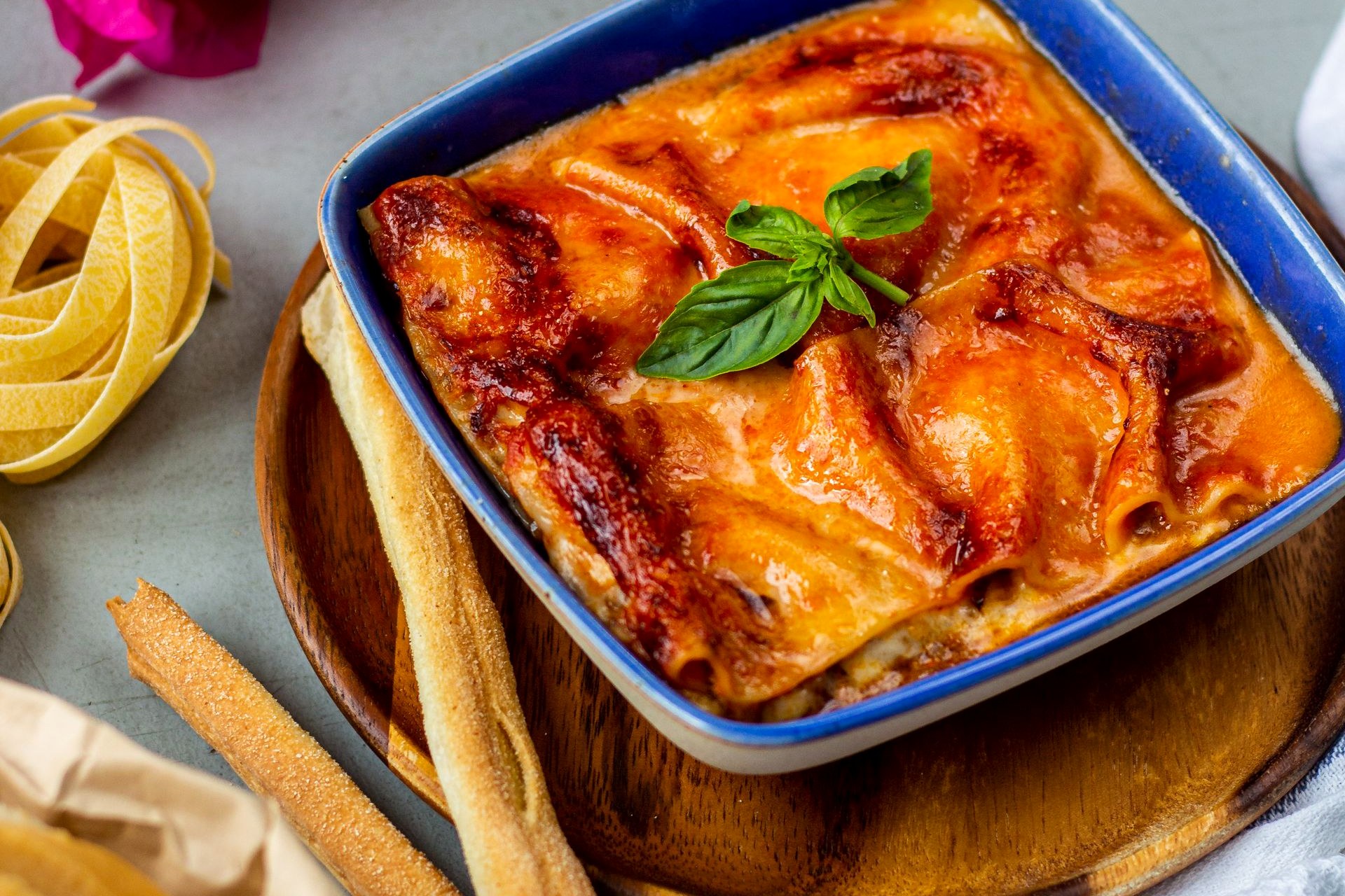 Menu — Pasta Baked lasagne in a blue oven dish
